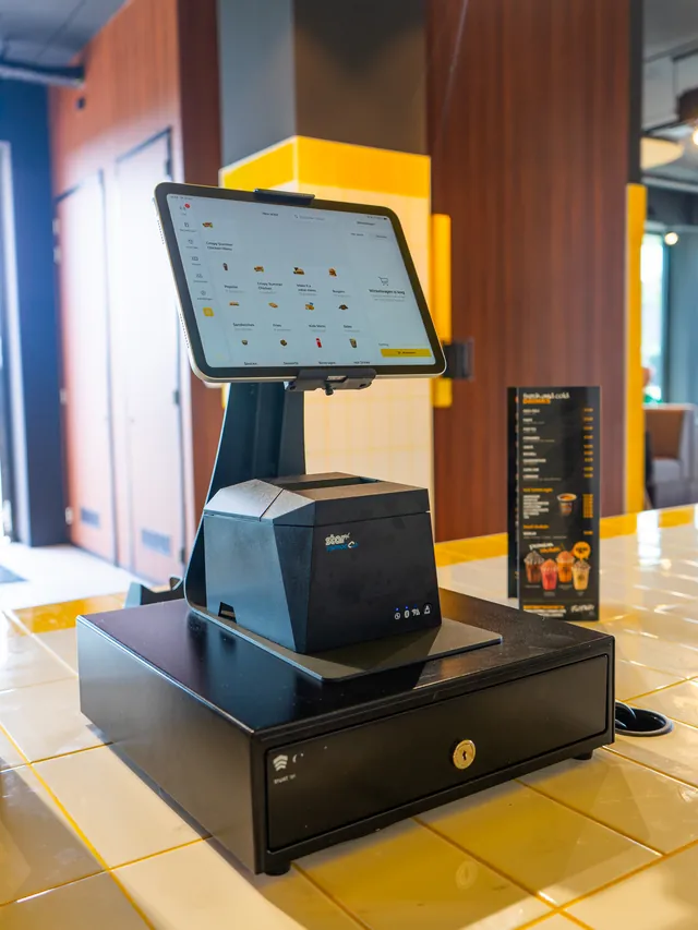 Onesix POS with receipt printer and cash drawer at the counter at Fat Phill's