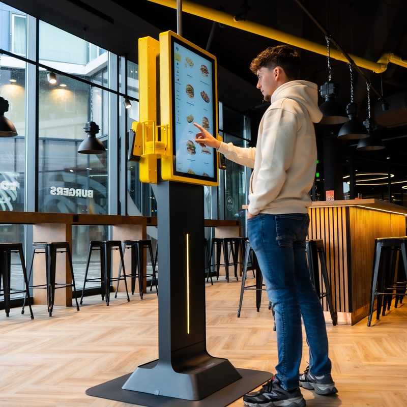 Guest ordering at ease at the Onesix Kiosk Premium X at Fat Phill’s