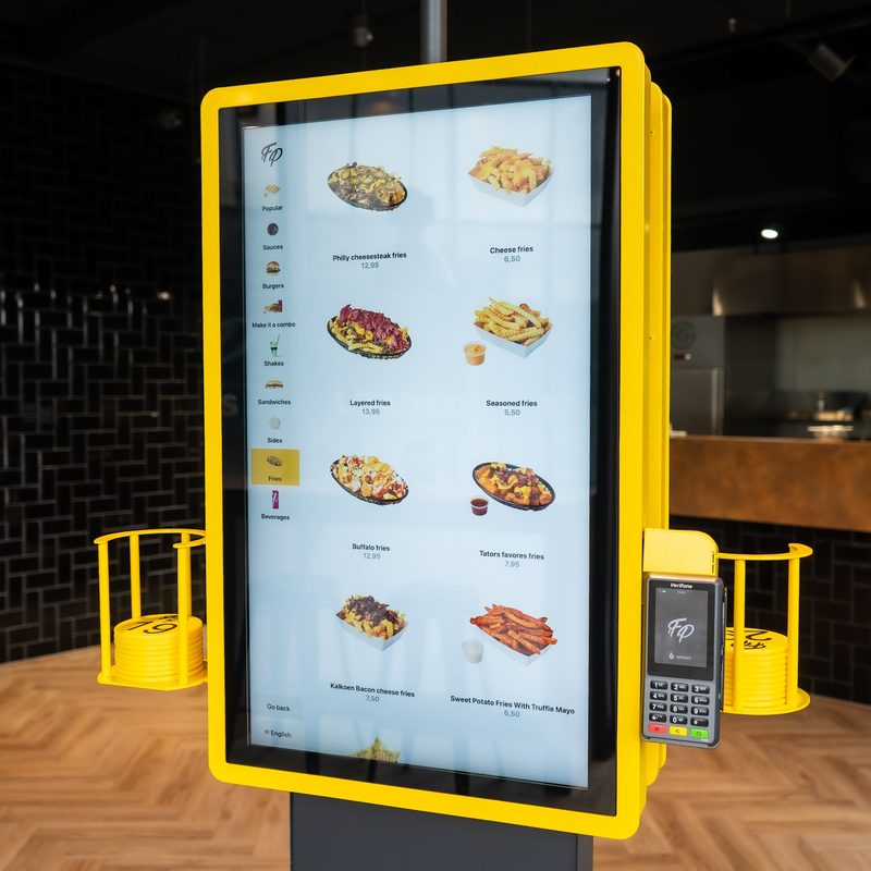 Yellow Onesix Kiosk Premium X showing Fat Phill’s menu